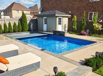 Landscaped outdoor pool with pool shed